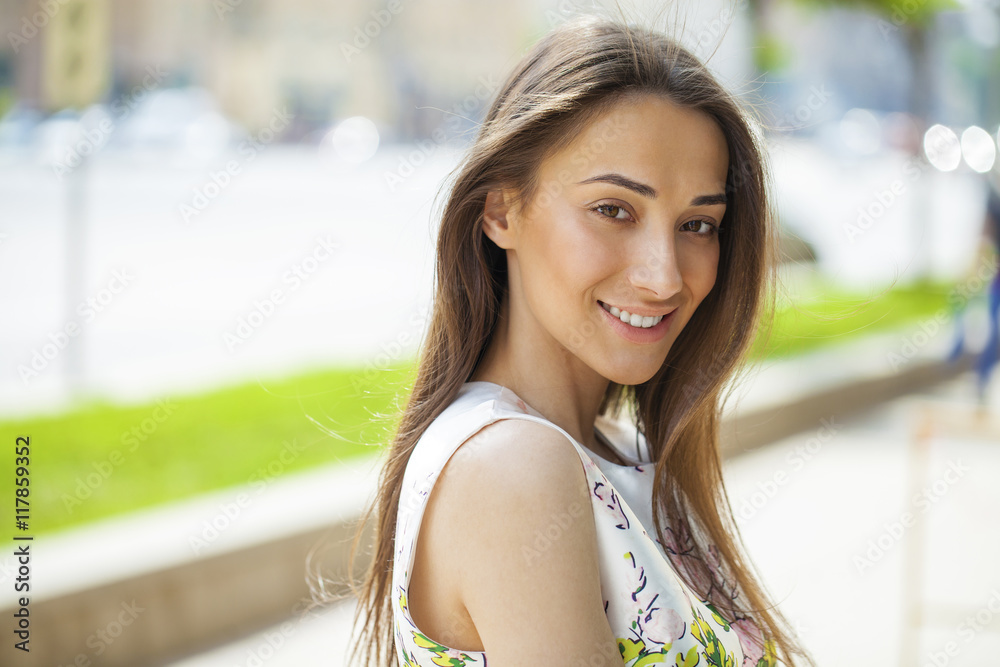 Fototapeta premium Portrait of beautiful young happy woman