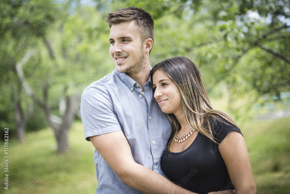 Happy loving young couple at the park Happy loving young couple at the park