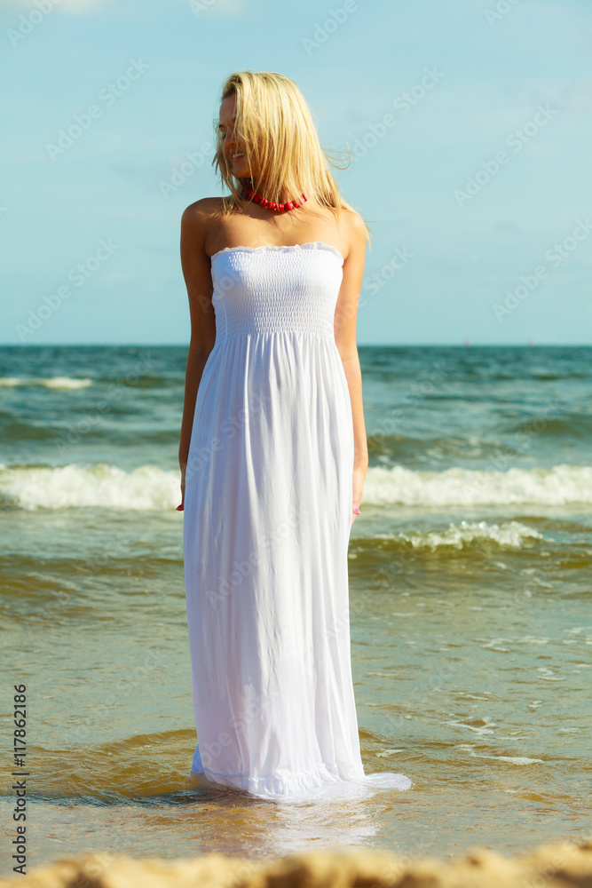 Attractive blonde woman on the beach. Attractive blonde woman on the beach.