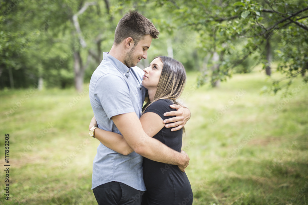 Happy loving young couple at the park Happy loving young couple at the park