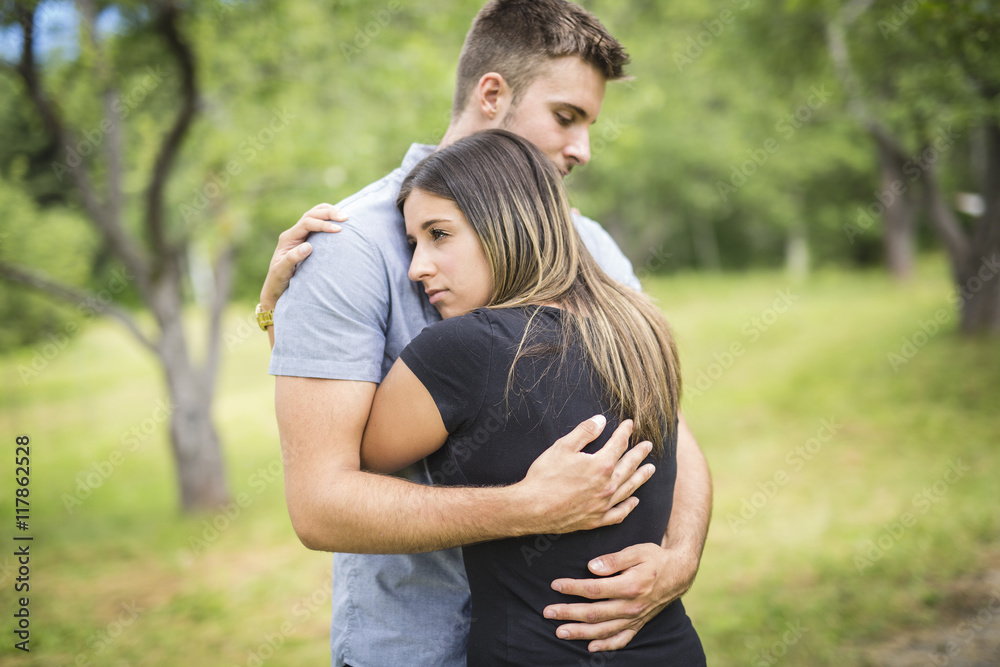 Fototapeta premium Happy loving young couple at the park