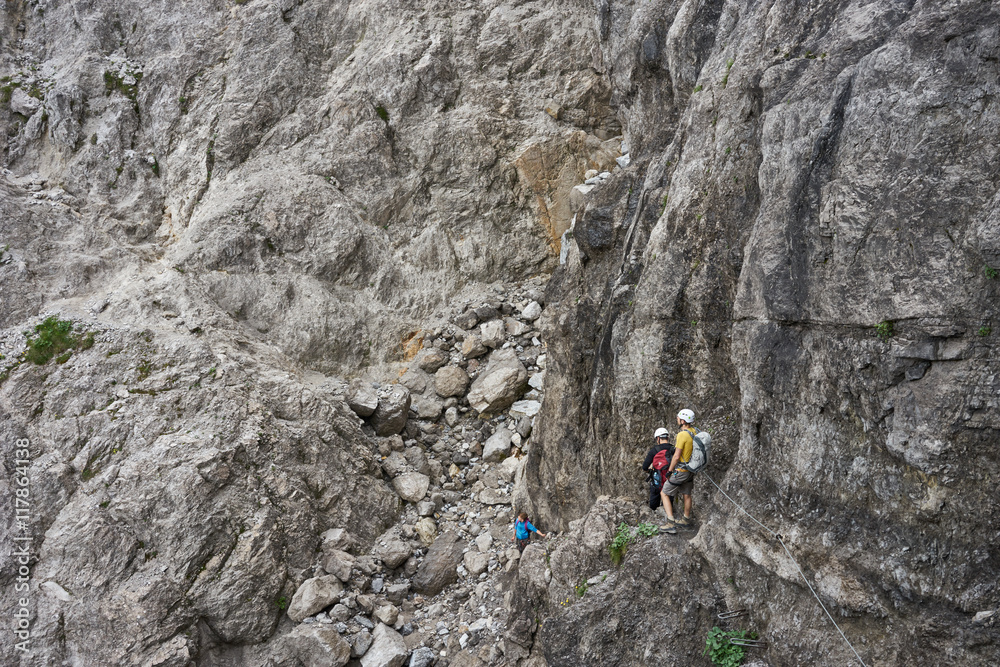 mountaineering men / climbing in the alps of Austria at Wilder Kaiser