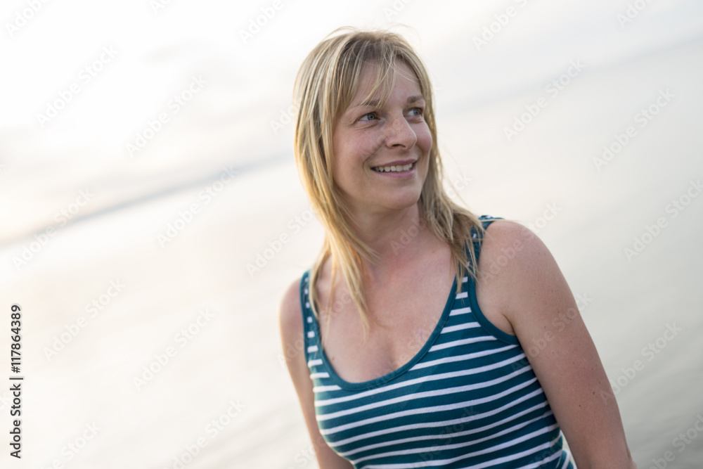 Portrait of a beautiful 37 years old woman outdoor at the beach 