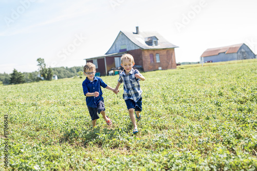 Two Children Together In field