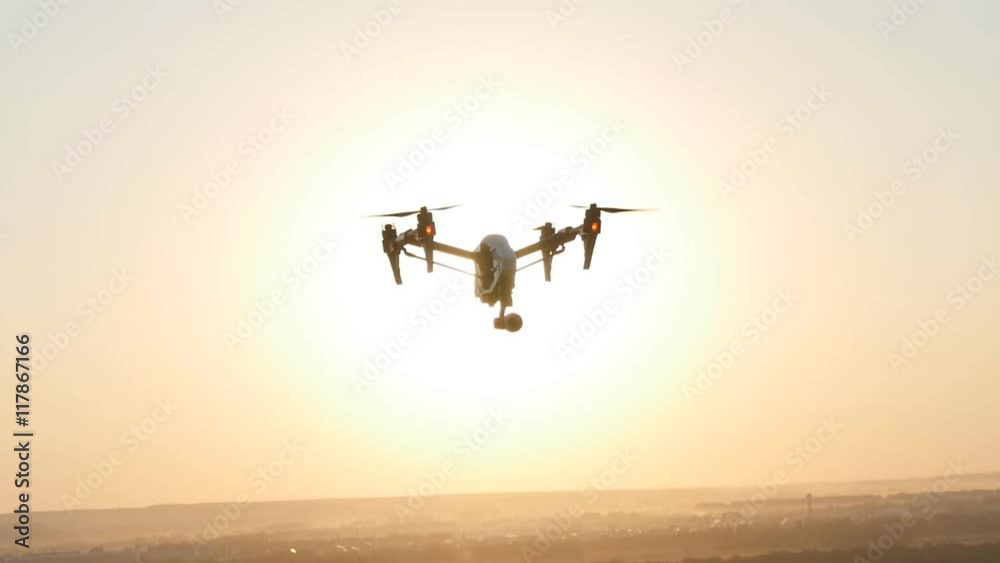 Quadrocopter drone with remote control. Quadrocopter drone with remote control.