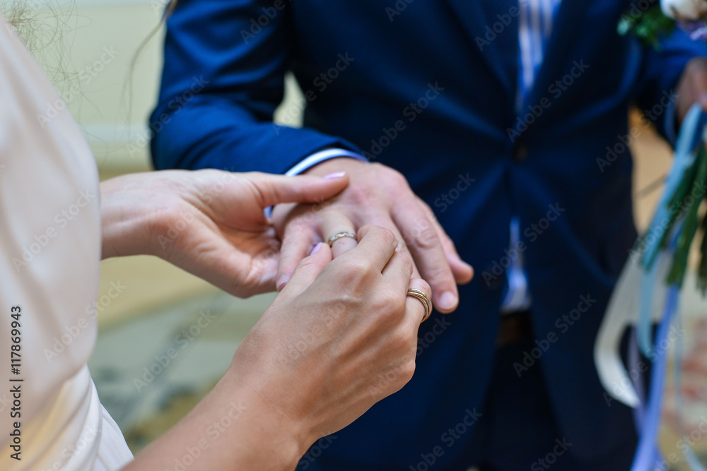 Fototapeta premium He Put the Wedding Ring on Her