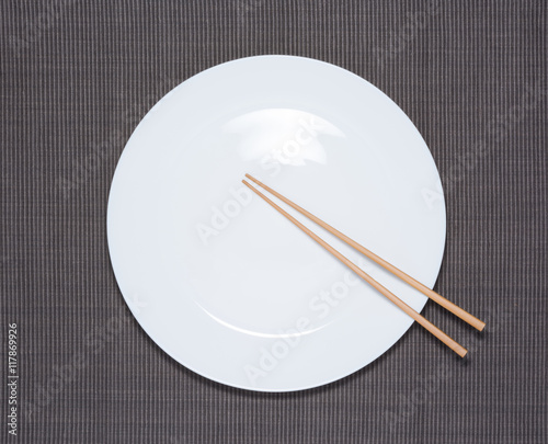 Blank white dish and chopsticks
