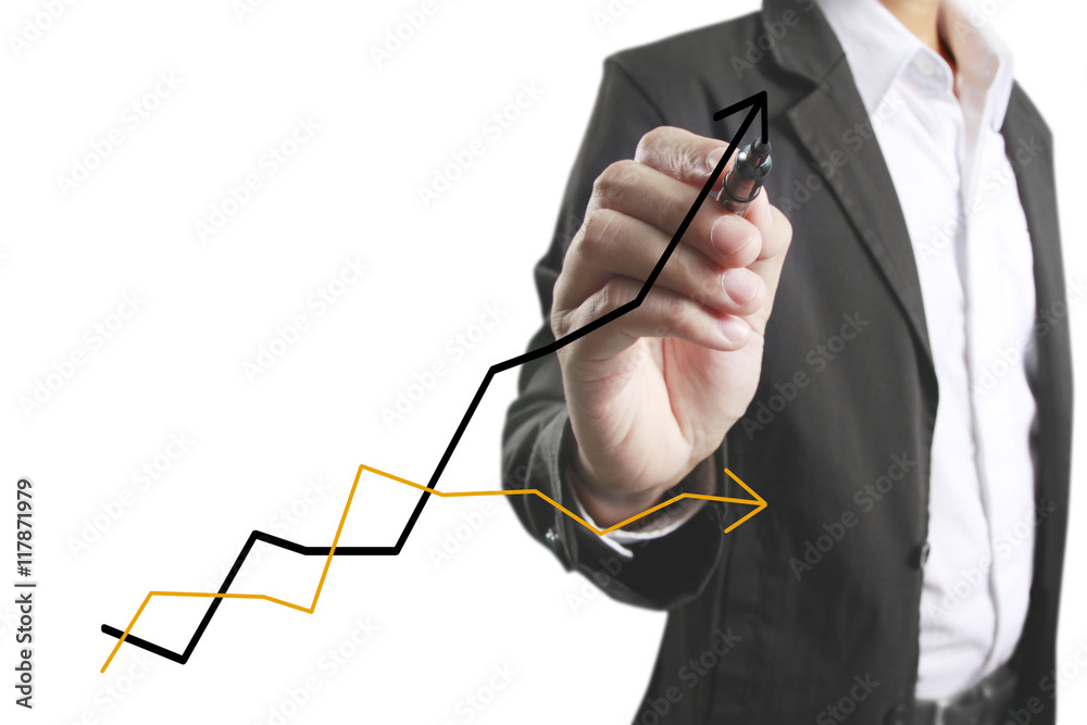 Businessman drawing graphics growing graph Businessman drawing graphics growing graph