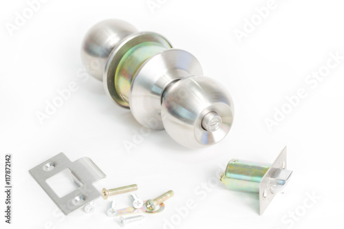 Stainless steel round ball door knob components isolated on white background as Locksmith concept.