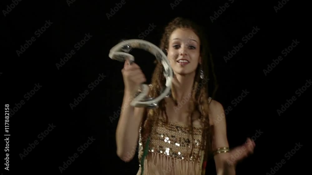 female percussion drummer performing with bongos female percussion drummer performing with bongos