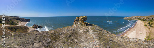 panorama of the sea coast with rocks and sand beach