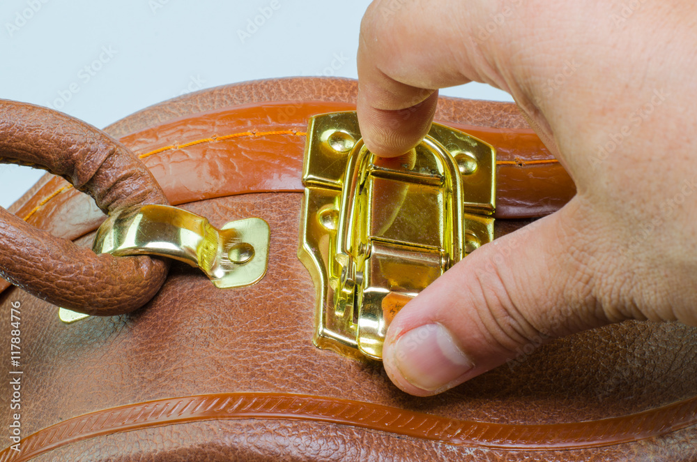 Obraz premium open suitcase brown with security code