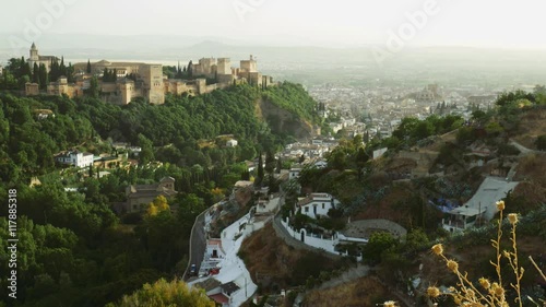 Beautiful view of Granada city in Spain with a famous alhambra tourist attraction on a hill