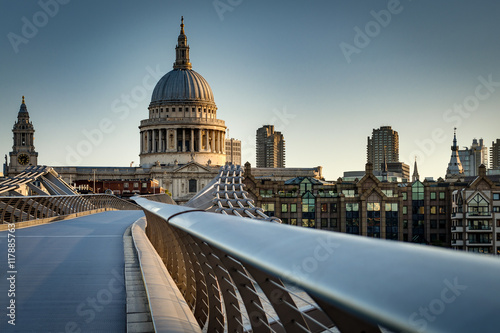 St Paul’s cathedral dome and the rail from the Millennium bridge, early in the morning twilight in London, England, UK. Saint Paul Cathedral is an Anglican church photo
