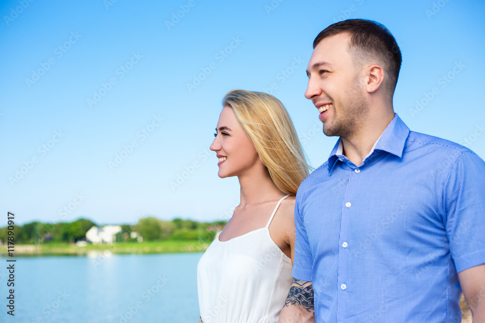 portrait of happy beautiful couple on summer beach portrait of happy beautiful couple on summer beach