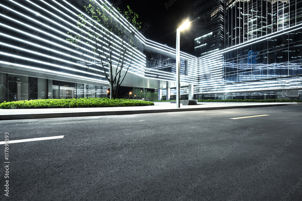 city empty traffic road with cityscape in background