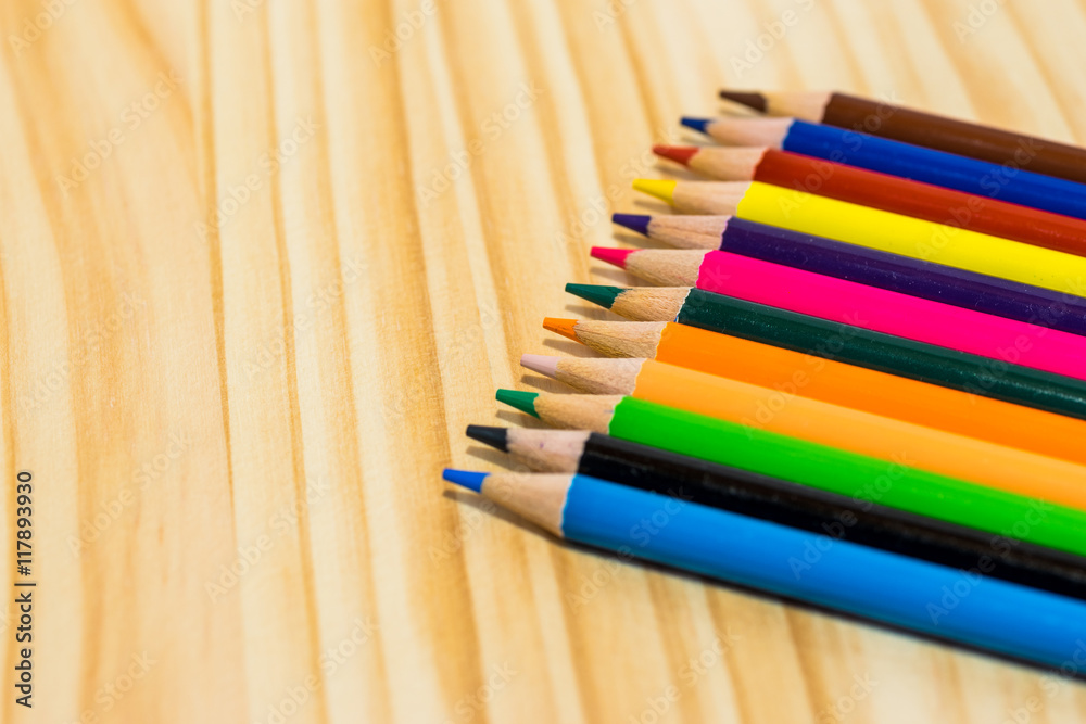 Obraz premium Colorful pencils on wooden background