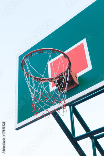 Wooden Basketball hoop on blue sky ,Basketball basket on blue sky © rawintanpin