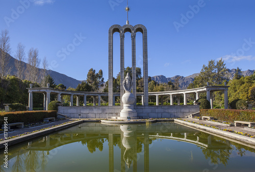 Huguenot Monument in Franschhoek against blue sky photo
