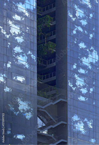 partes de un edificio de cristal y acero en la ciudad de hospitalet (barcelona),rascacielos photo