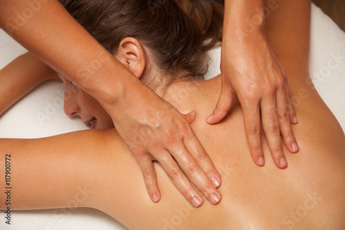 Woman receiving a masage photo