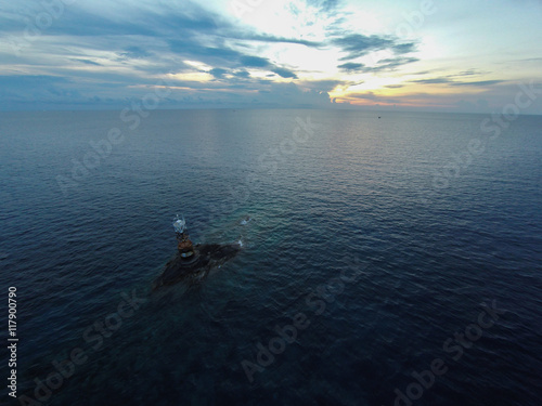 Ocean sea sunset view and lighthouse. Gulf of Thailand sea, Thailand, Wide angle view.