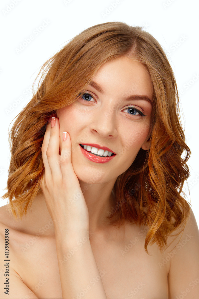 Beautiful young woman with blue eyes and red lips touching her c Beautiful young woman with blue eyes and red lips touching her c