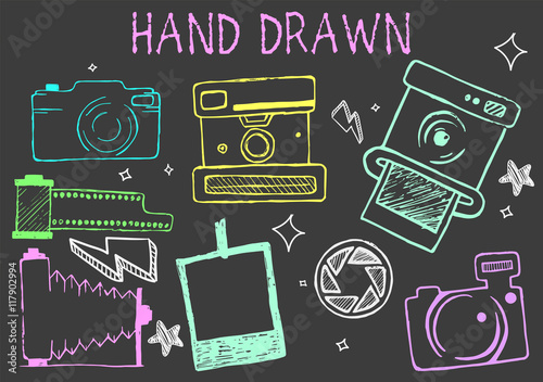Vector hand drawn chalk illustration of cameras from different times. Photographic equipment set.