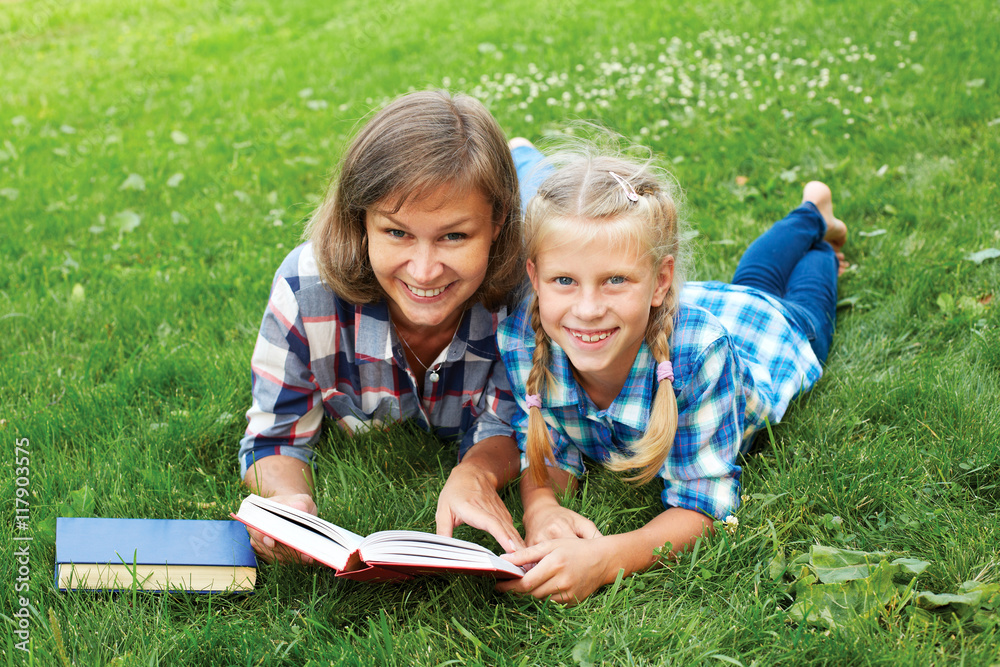 Parent and child reading books together Parent and child reading books together