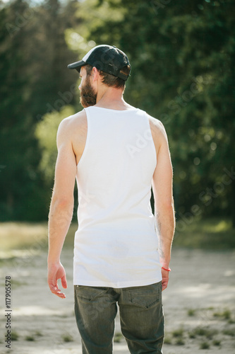hipster wearing white blank t-shirt with space for your logo
