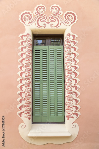 Decorative window of Gaudi House Museum photo