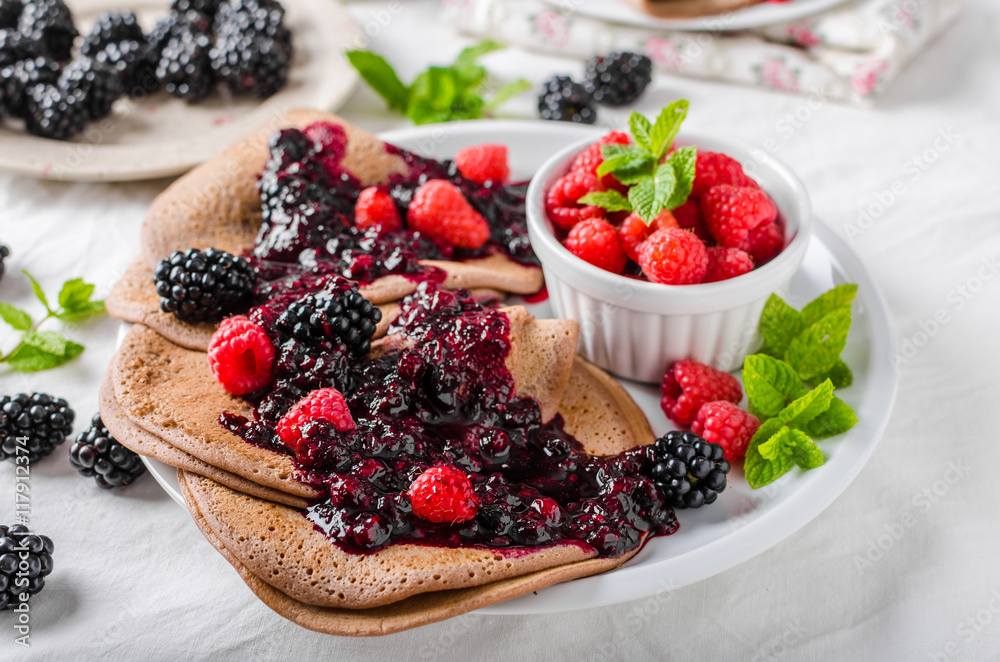 Cocoa pancakes with forest fruit