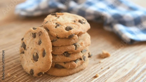 Chocolate cookies on wooden table.