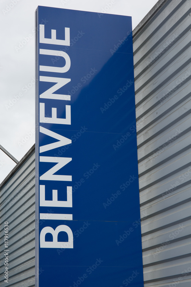 The French Word Bienvenue, which means Welcome, written on billboard The French Word Bienvenue, which means Welcome, written on billboard