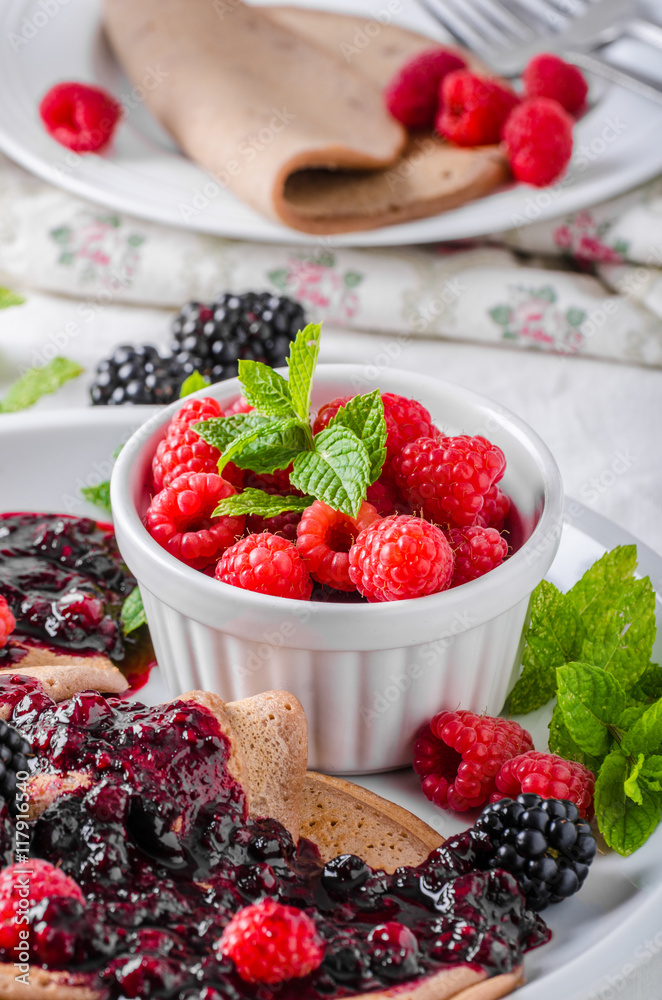 Cocoa pancakes with forest fruit