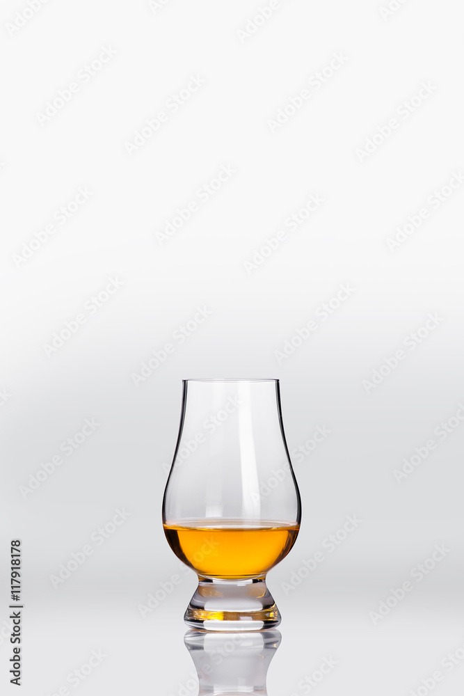 tasting a glass of whisky tasting a glass of whisky