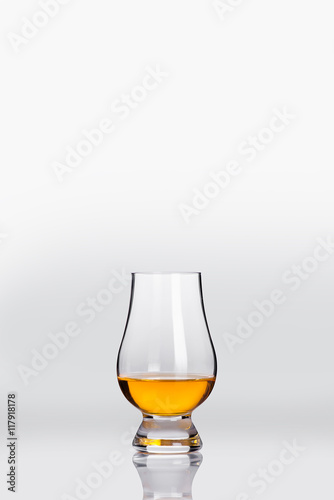 tasting a glass of whisky 