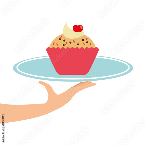 hand holding a tray of cupcakes