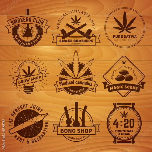 Set of vector marijuana smoking badges. Medical cannabis labels on a wooden background