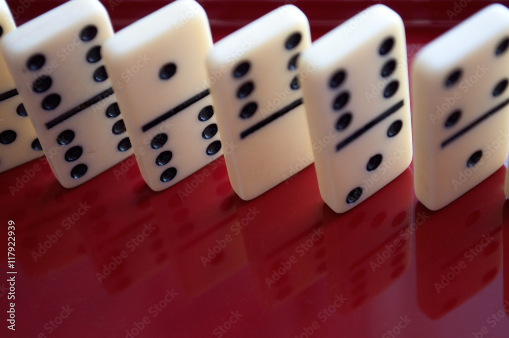 Black and white dominoes on the table Black and white dominoes on the table