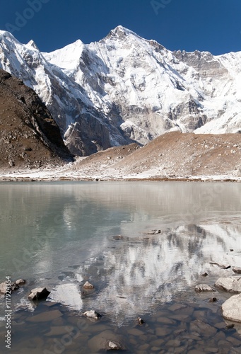 view of Cho Oyu mirroring in lake - Cho Oyu base camp