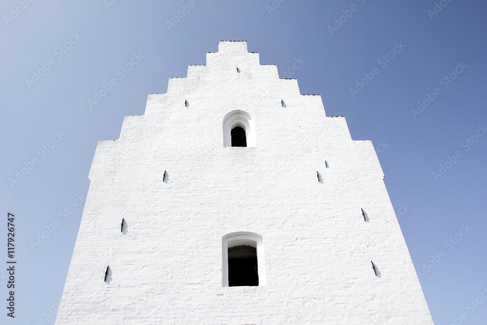 A gable of a traditional white northern church. 