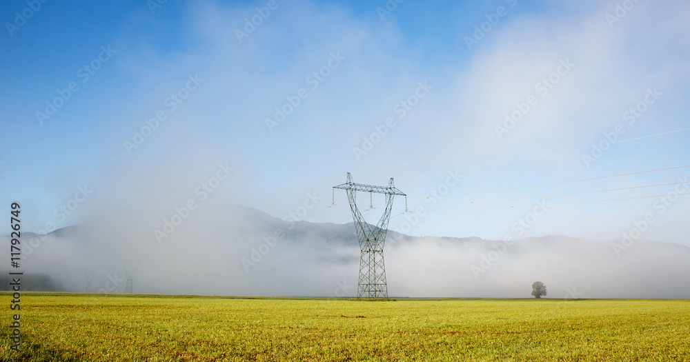 Big electricity high voltage pylon with power lines