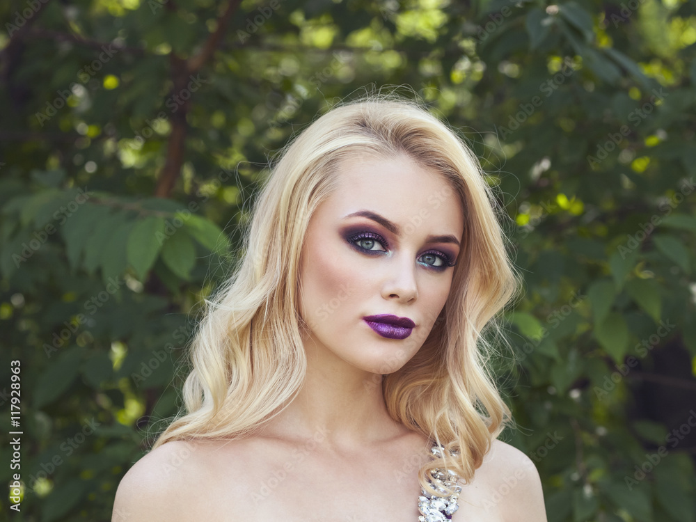 Fototapeta premium outdoor portrait of fashion young beautiful woman with long blon