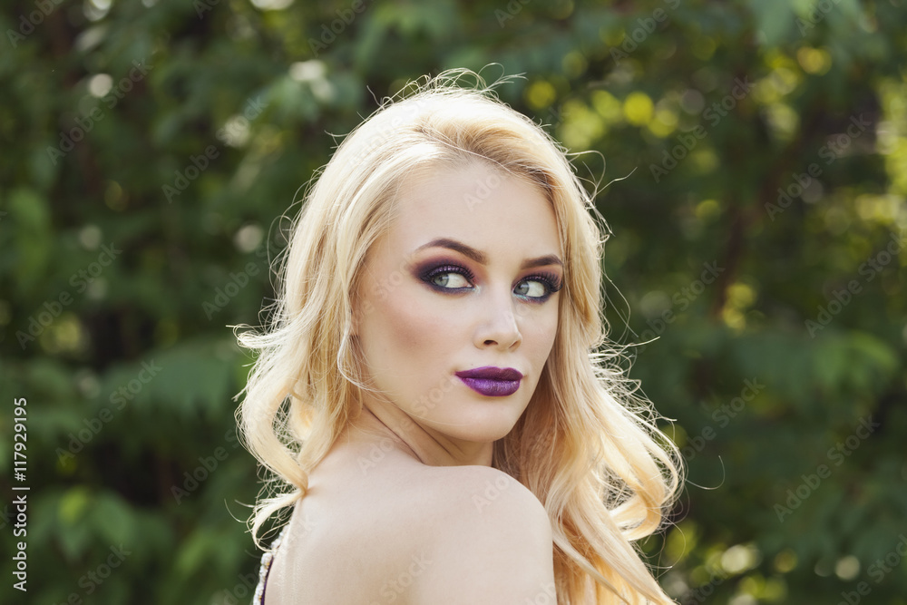 Naklejka premium outdoor portrait of fashion young beautiful woman with long blon