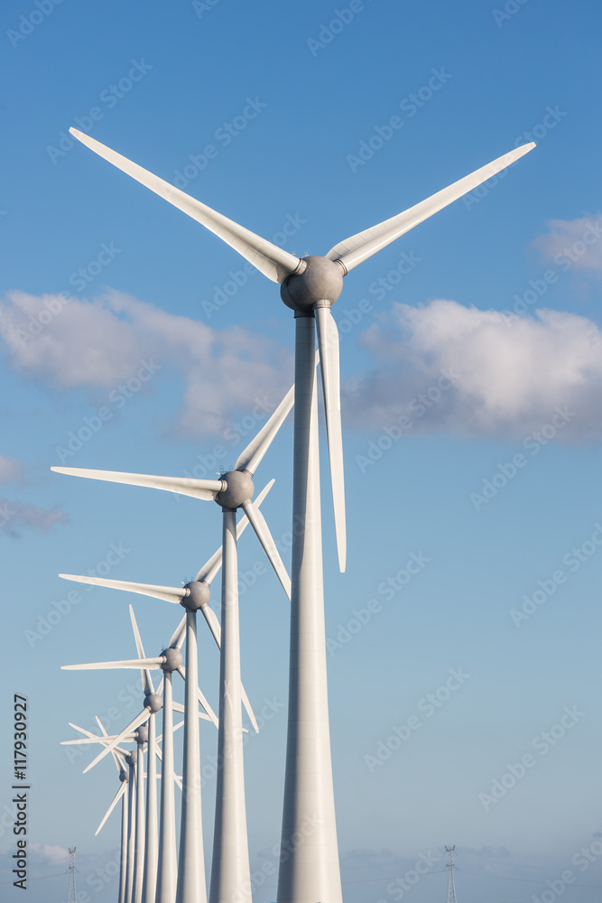 Row of wind turbines and blue sky Row of wind turbines and blue sky