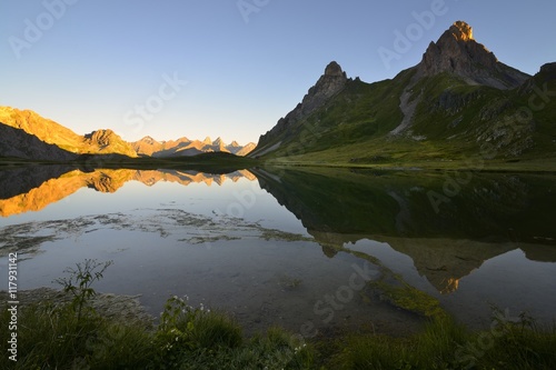 The beautiful Cerces lake with the savoyard mountains in the background, Savoy, France.