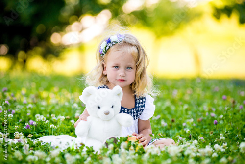 Little girl walking in the park