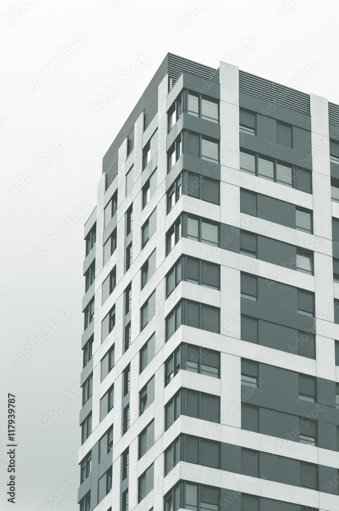 Skyscraper against the sky. Low view. Empty copy space for Editor's text. Skyscraper against the sky. Low view. Empty copy space for Editor's text.