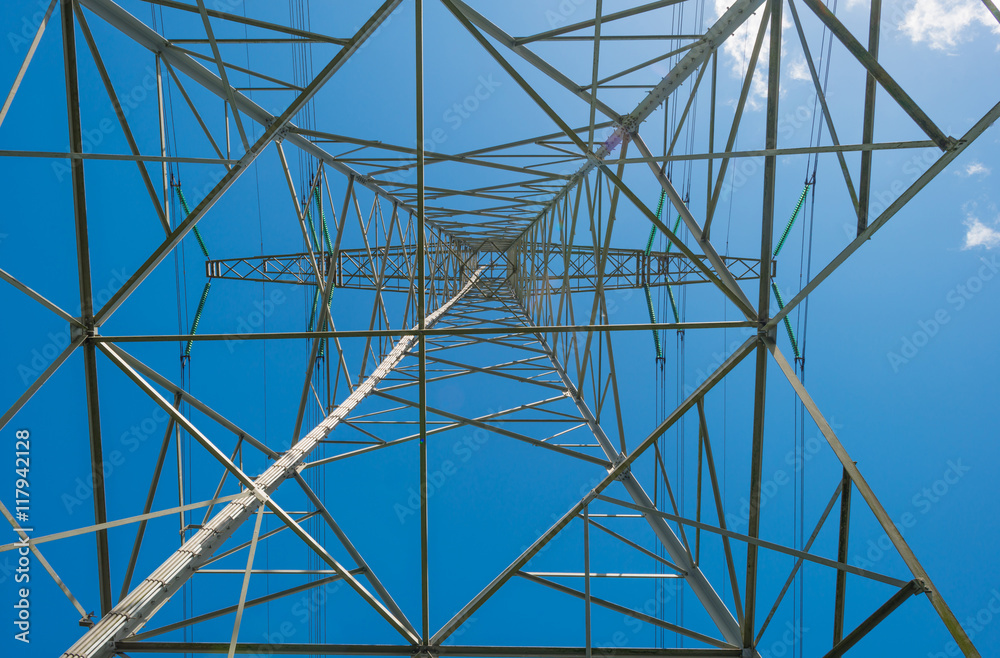 Overhead power line in a blue sky